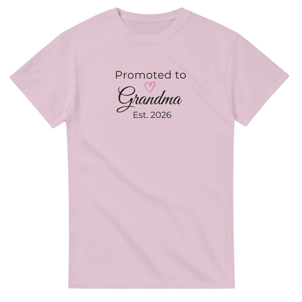 Promoted to Grandma Est. 2026 T-Shirt in blush pink with “Promoted to Grandma” text, heart icon, and “Est. 2026” design printed on the front